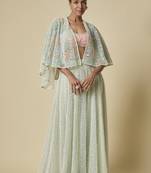 Mint heavy gharara pant with peach blouse and mint embroidered cape