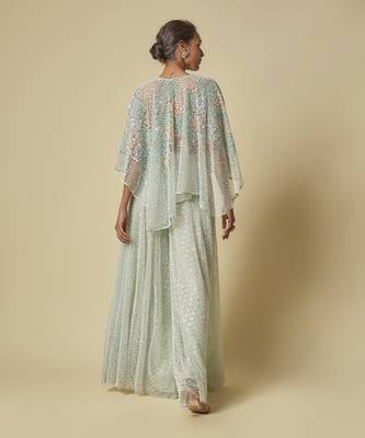 Mint heavy gharara pant with peach blouse and mint embroidered cape 3