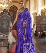 Luxurious royal purple satin silk saree with intricate weaving design