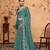 teal embroiderd organza saree with unstitched blouse piece