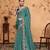 teal embroiderd organza saree with unstitched blouse piece