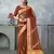 rust tissue silk blend zari work saree with unstitched blouse piece