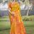 yellow silk woven work festival tassle saree