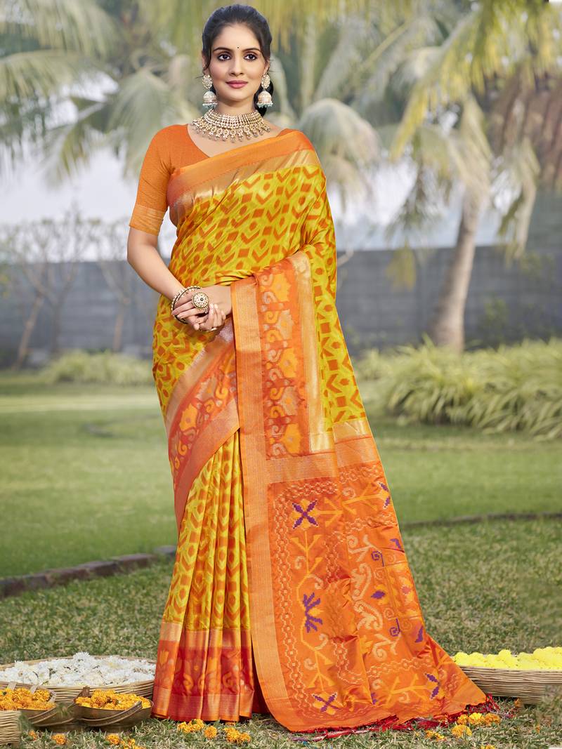 yellow silk woven work festival tassle saree