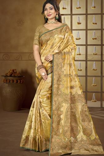 yellow silk woven work festival tassle saree
