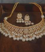 Women white & gold toned kundan studded & beaded earrings