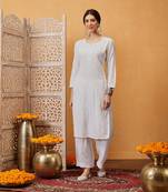Hand embroidered white cotton lucknowi chikankari straight kurta/palazzo set with muqaish work