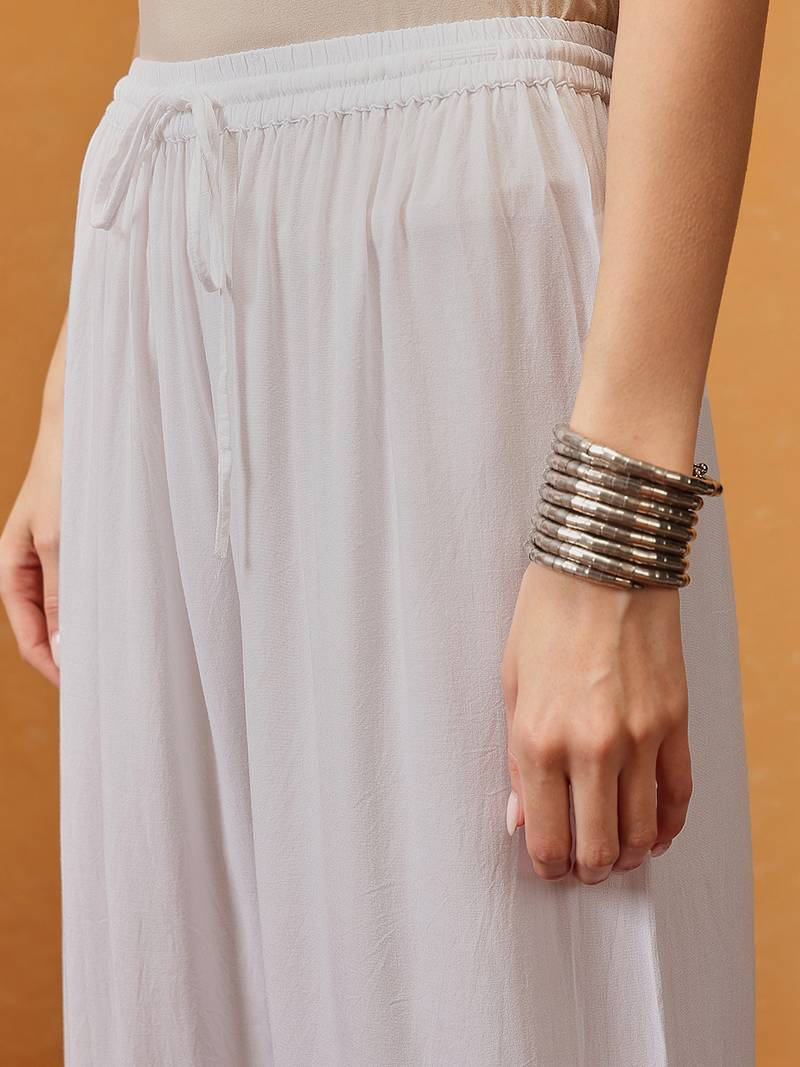 Hand embroidered white cotton lucknowi chikankari straight kurta/palazzo set with muqaish work