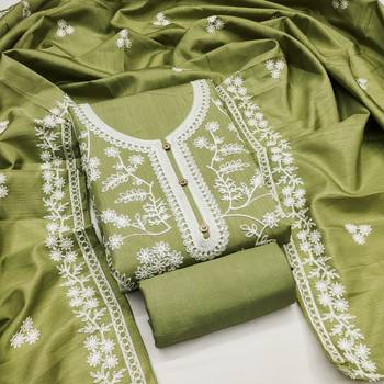 Women's green heavy thread embroidery jalpari silk dress material 1