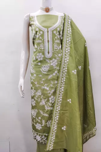 Women's green heavy thread embroidery jalpari silk dress material
