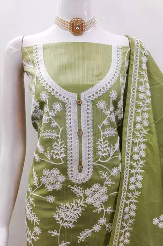 Women's green heavy thread embroidery jalpari silk dress material