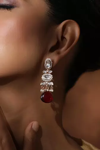 Red polki dangler earrings