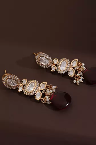 Red polki dangler earrings