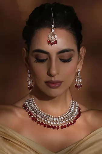 Red polki necklace set with maang tikka