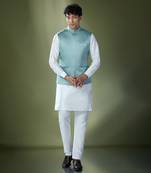 Teal blue quilted kurta-jacket set