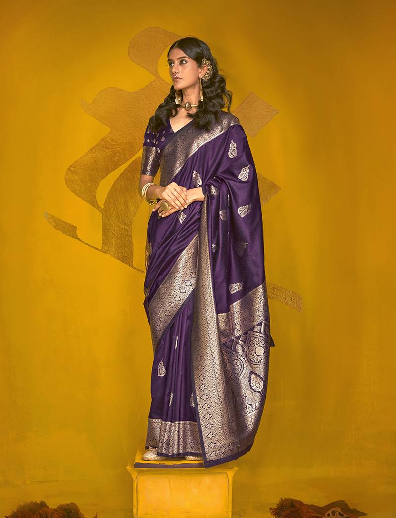 Charming dark purple color silk saree with fine zari weave
