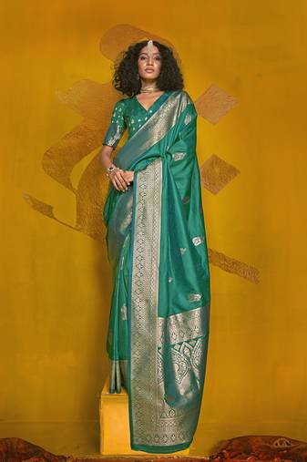 Turquoise color silk blend saree with zari weave