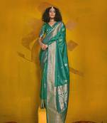 Turquoise color silk blend saree with zari weave