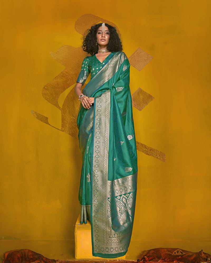 Charming turquoise  color silk saree with fine zari weave