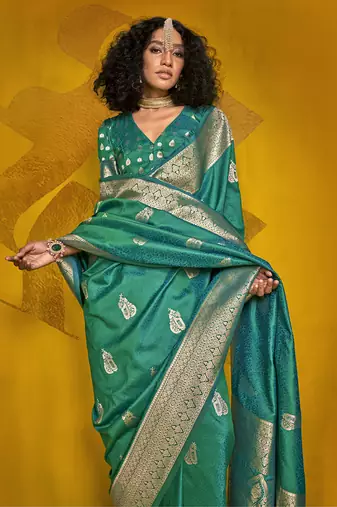 Turquoise color silk blend saree with zari weave