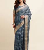 Dusty blue cotton floral print ajrakh print golden zari border tassels saree with unstiched blouse piece