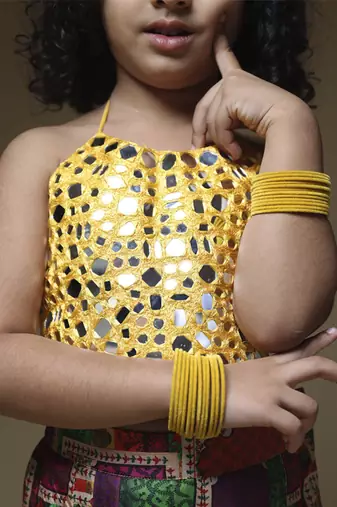 Yellow hand embrodiered halter top with pleated pant