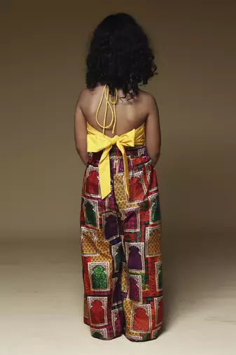 Yellow hand embrodiered halter top with pleated pant