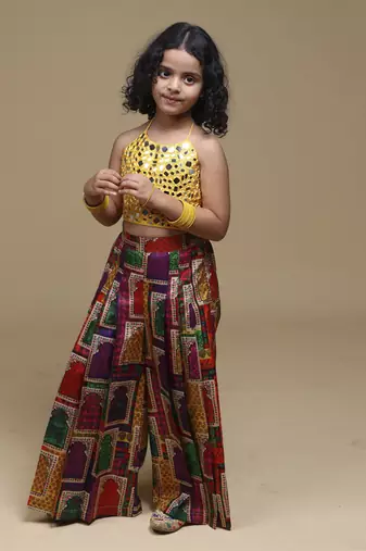Yellow hand embrodiered halter top with pleated pant