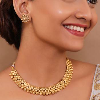 Artisan crafted antique gold necklace set with floral tops 1