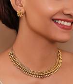 Charming antique gold delicate necklace set adorned with carved leaf patterns earrings