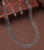 Stunning oxidized silver long necklace set with delicate earrings.