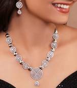 Exquisite circular self design american diamond necklace set with matching earrings