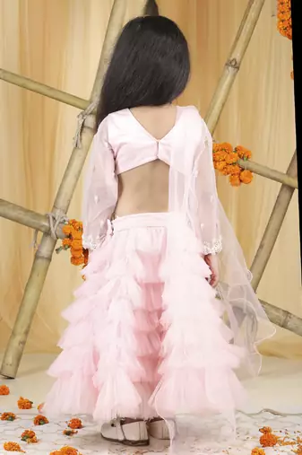 Baby pink pearl hand embroidery on blouse with net tulles lehanga set