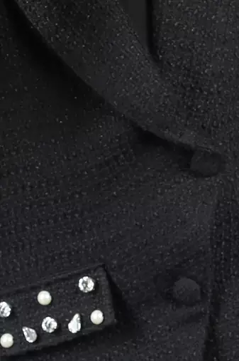 Black dress with detailing on pocket