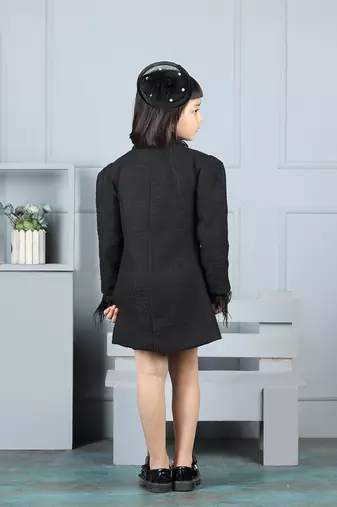 Black dress with detailing on pocket