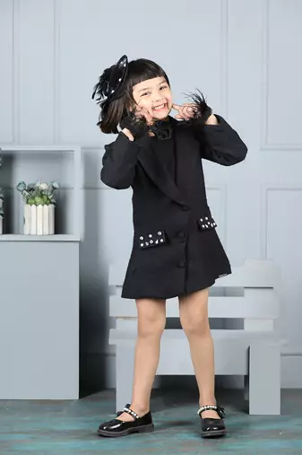 Black dress with detailing on pocket