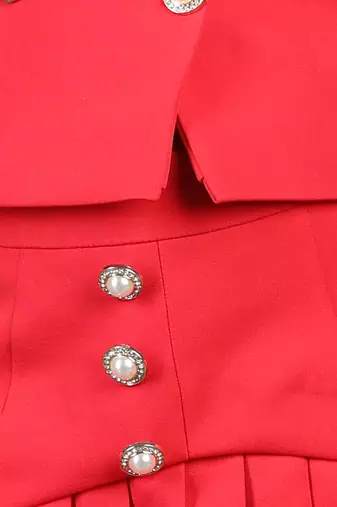 Red coord set with detailed skirt