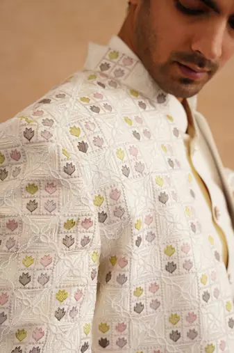 White indowestern embroidered with thread and pearl on silk