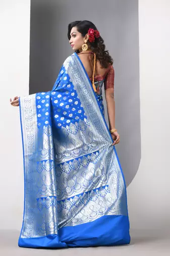 Sky blue katan silk blend banarasi saree with zari woven ethnic designs