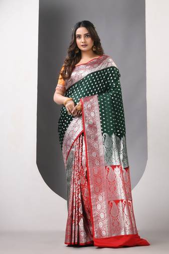 Bottle green katan silk blend banarasi patli pallu saree with zari woven ethnic designs