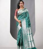 Teal green katan silk blend patli pallu banarasi saree with zari woven ethnic designs