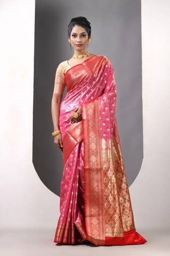 Pink satin silk blend emboss banarasi saree with zari woven ethnic motifs