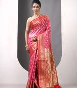 Pink satin silk blend emboss banarasi saree with zari woven ethnic motifs