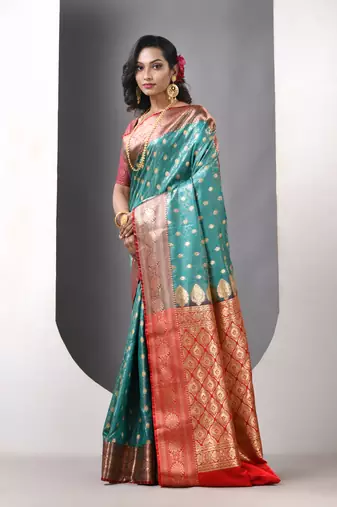 Teal satin silk blend emboss banarasi saree with zari woven ethnic motifs