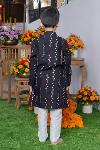 Black embroidered silk kurta with multicolored floral detailing and white pants