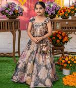 Grace in bloom: stunning floral gown with elegant embellishments for festive occasions