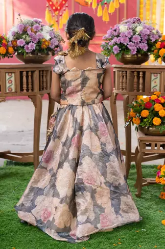 Grace in bloom: stunning floral gown with elegant embellishments for festive occasions