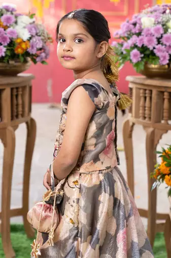 Grace in bloom: stunning floral gown with elegant embellishments for festive occasions