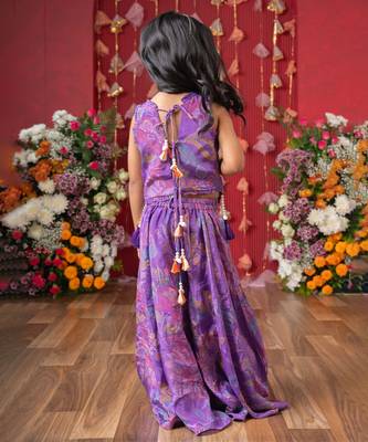 Add a pop of color to your celebrations with this vibrant purple printed top and flared palazzo set 3