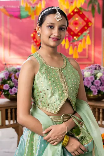 Enchanting pastel green lehenga set with golden embroidery